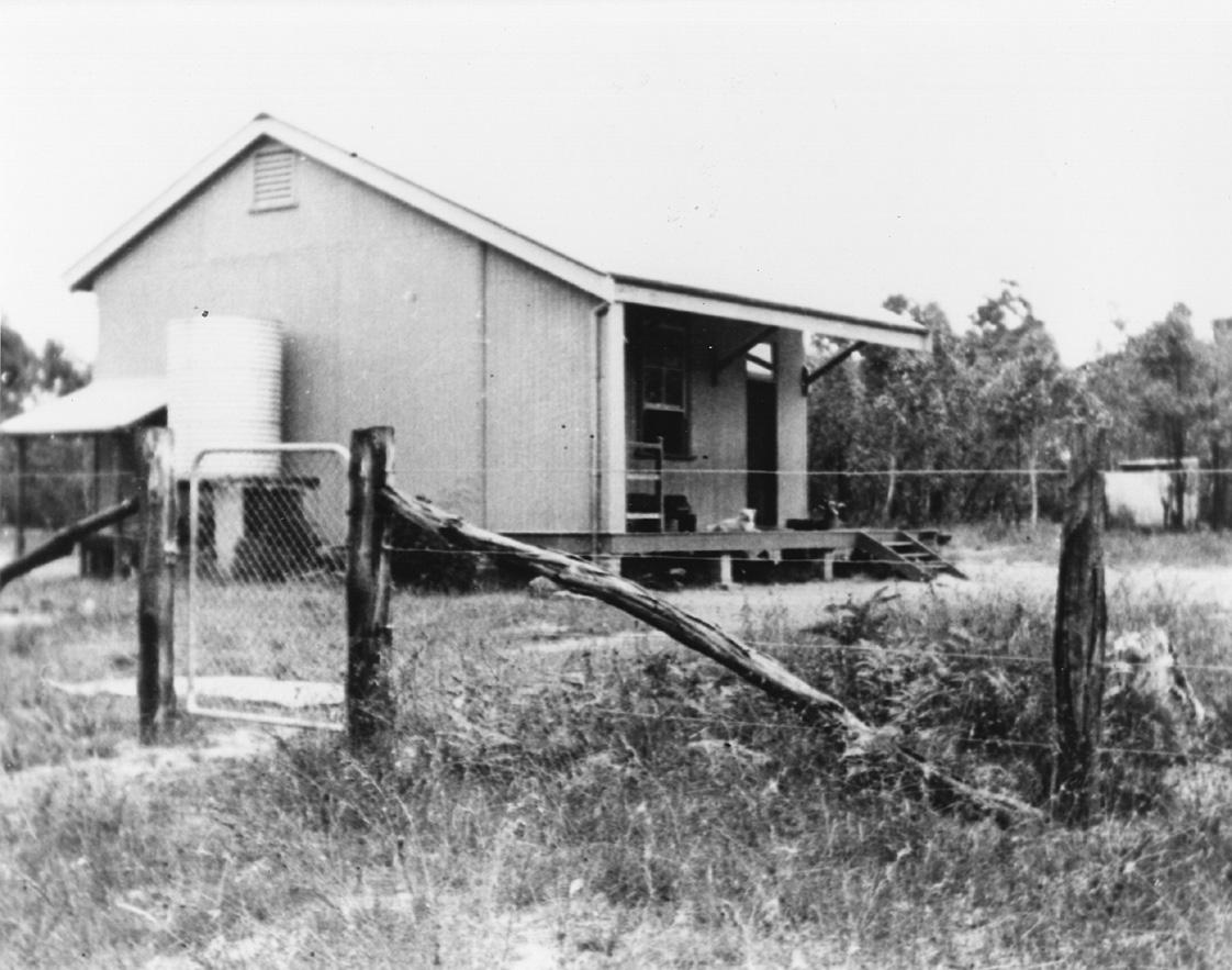 The Glenlee first school building with water tank